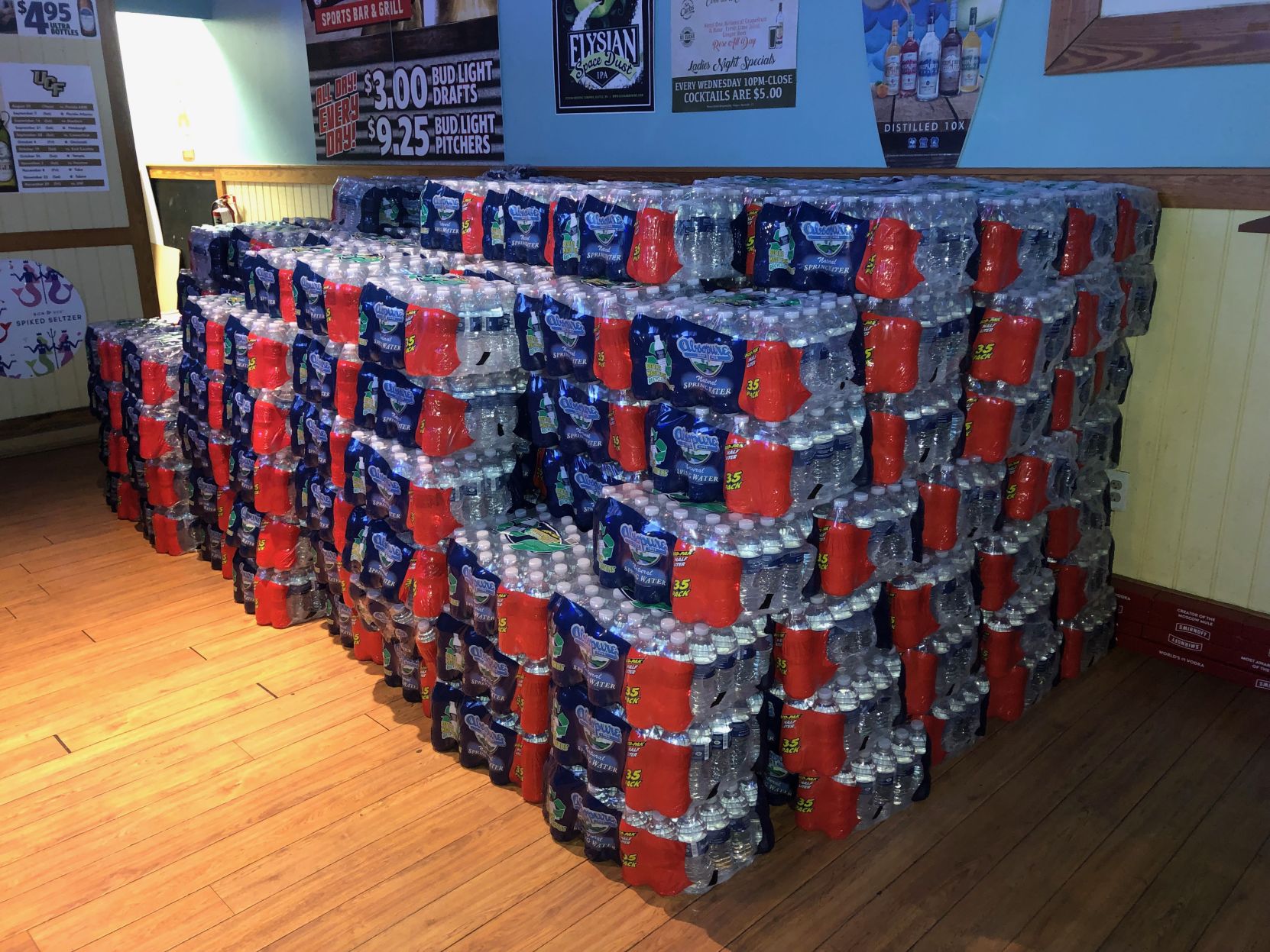 Local UCF bar gives out free cases of water bottles for Hurricane Dorian